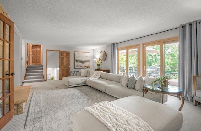 4111 Auburn Dr, Minnetonka, MN 55305 - carpeted living area featuring a textured ceiling and stairs
