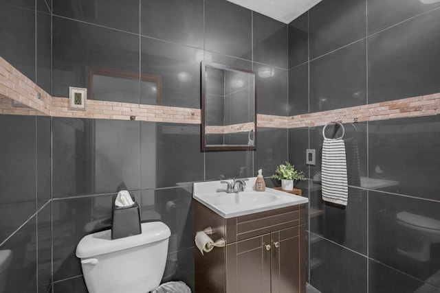 4111 Auburn Dr, Minnetonka, MN 55305 - half bathroom featuring tile walls and vanity