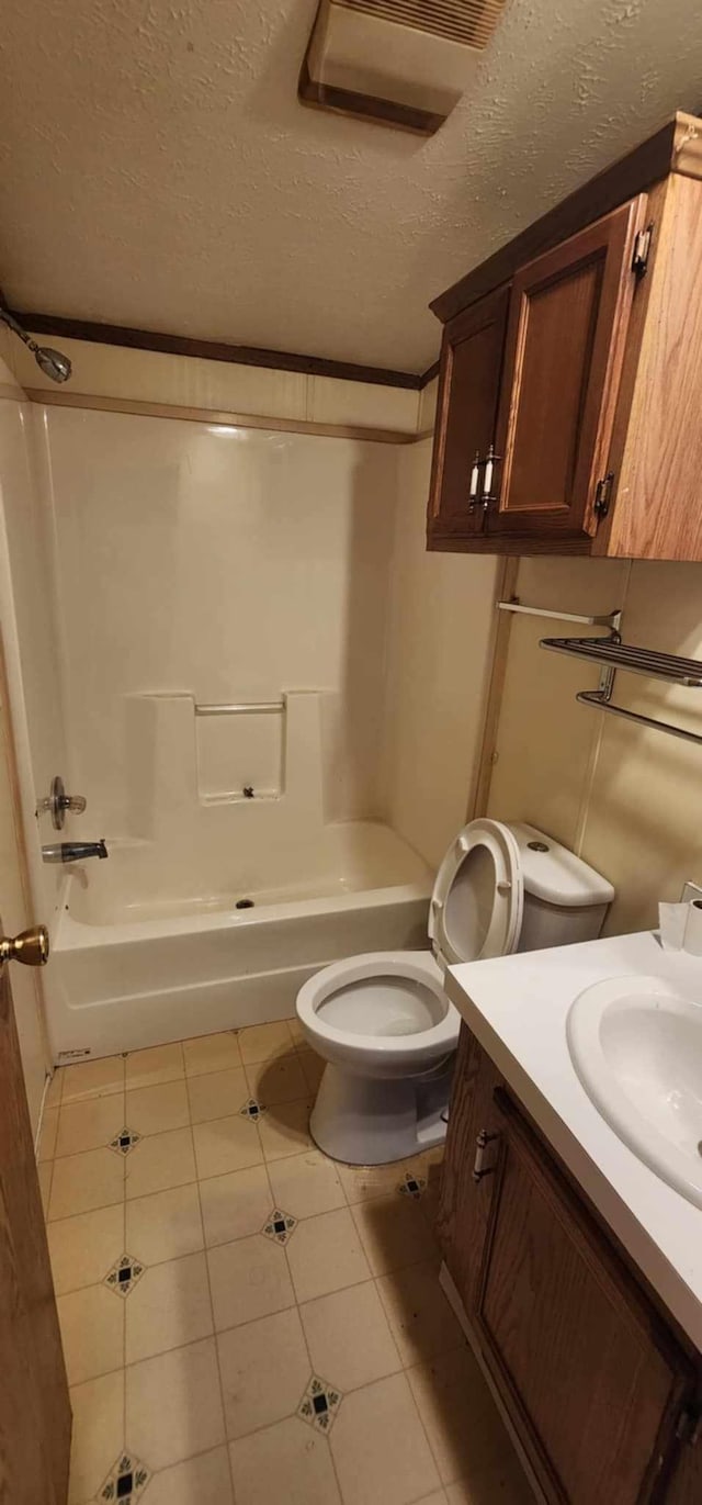 4550 Central Ave NE Unit 1011, Hilltop, MN 55421 - full bath with tile patterned flooring, vanity, and bathing tub / shower combination