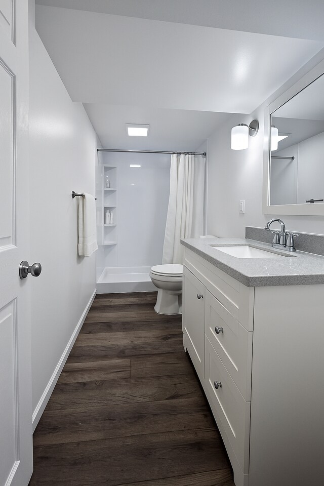 5521 Emerson Ave S, Minneapolis, MN 55419 - full bathroom featuring vanity, wood finished floors, a shower with curtain, and built in shelves