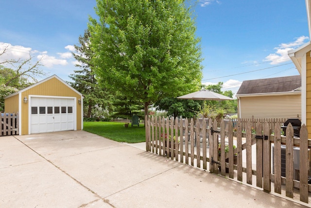 5521 Emerson Ave S, Minneapolis, MN 55419 - detached garage featuring concrete driveway