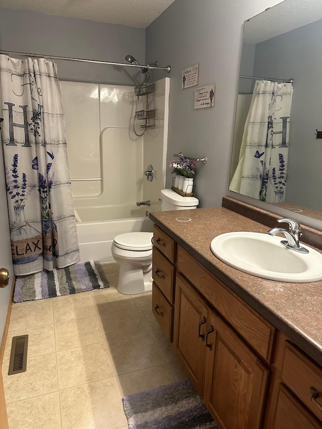 2460 Fox Hollow Ln, Owatonna, MN 55060 - full bathroom with vanity, shower / tub combo with curtain, and tile patterned flooring