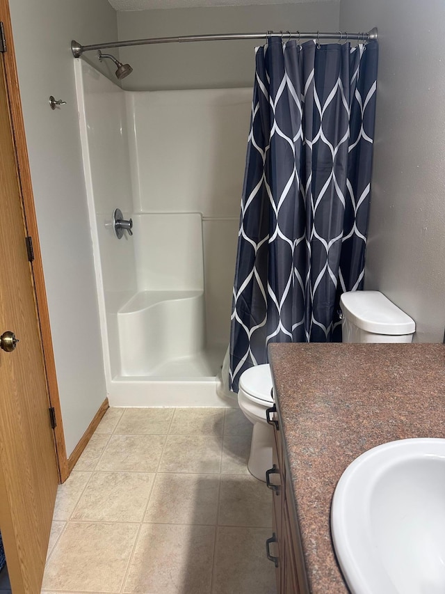 2460 Fox Hollow Ln, Owatonna, MN 55060 - full bathroom featuring vanity, a shower with curtain, and tile patterned flooring