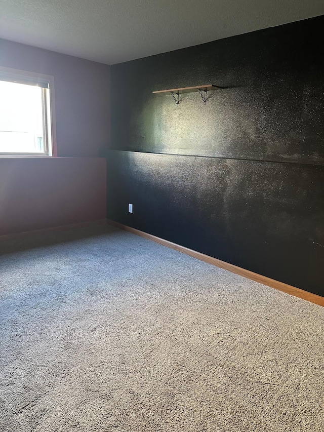 2460 Fox Hollow Ln, Owatonna, MN 55060 - spare room with carpet flooring and baseboards