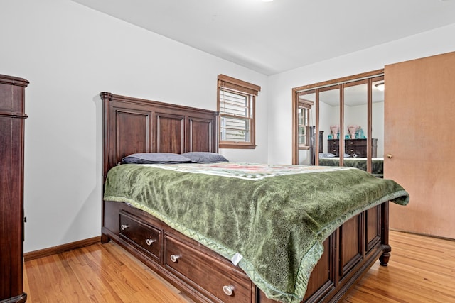 3836 Buchanan St NE, Columbia Heights, MN 55421 - bedroom featuring light wood-style floors and access to exterior