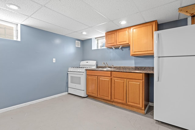 3836 Buchanan St NE, Columbia Heights, MN 55421 - kitchen featuring white appliances, a paneled ceiling, finished concrete flooring, dark countertops, and recessed lighting