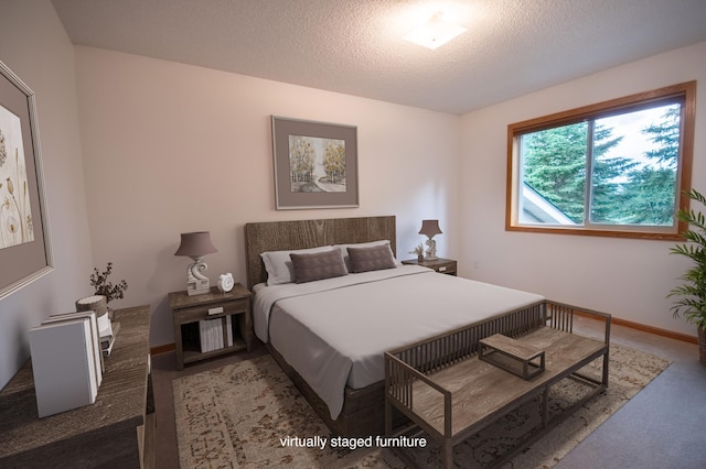 706 Country Club Dr SW, Melrose, MN 56352 - carpeted bedroom with a textured ceiling and baseboards
