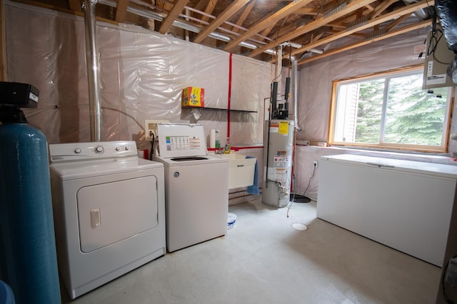 706 Country Club Dr SW, Melrose, MN 56352 - laundry room featuring independent washer and dryer and water heater