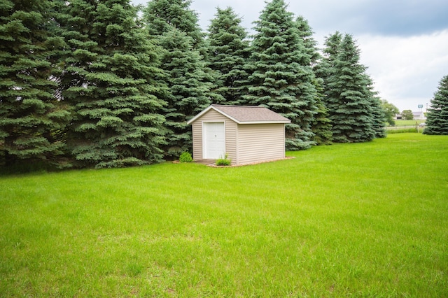706 Country Club Dr SW, Melrose, MN 56352 - view of green lawn featuring a storage unit