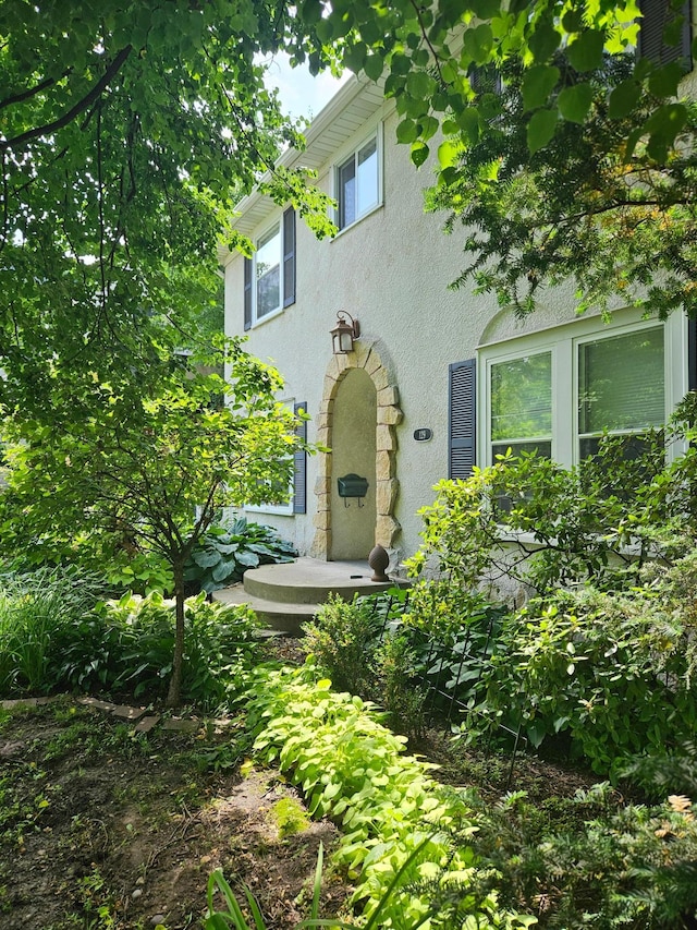 129 50th St, Minneapolis, MN 55419 - view of front facade featuring stucco siding