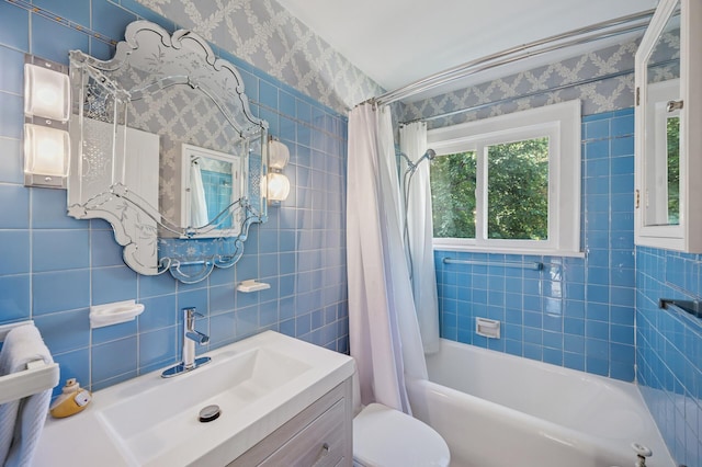 129 50th St, Minneapolis, MN 55419 - full bathroom with wallpapered walls, shower / bath combo, vanity, and tile walls