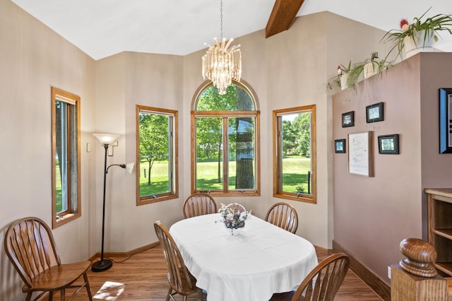 7023 State Highway 114 SW, Lake Mary Twp, MN 56308 - dining area featuring light wood-style floors, a chandelier, and beamed ceiling