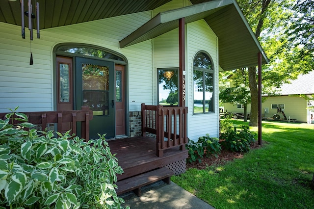 7023 State Highway 114 SW, Lake Mary Twp, MN 56308 - doorway to property featuring a lawn and covered porch