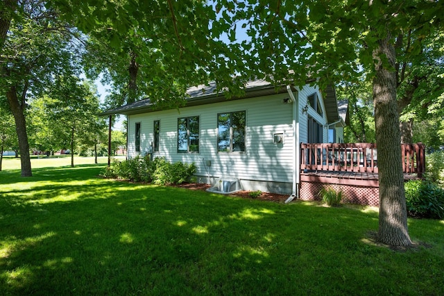 7023 State Highway 114 SW, Lake Mary Twp, MN 56308 - view of side of home with a deck and a lawn