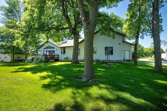 7023 State Highway 114 SW, Lake Mary Twp, MN 56308 - view of green lawn with a deck