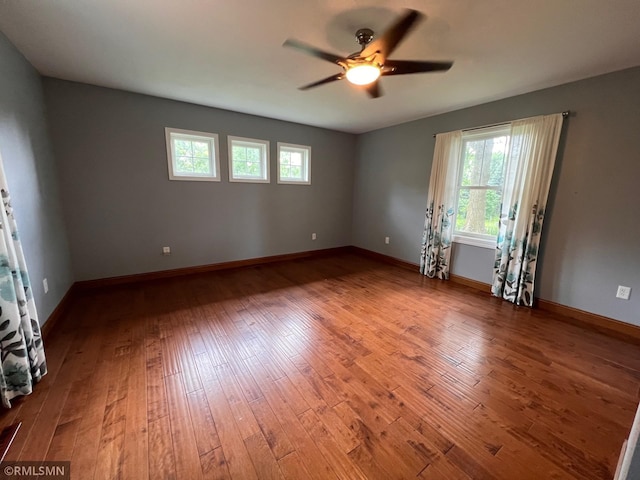 1200 Lake St, Osakis, MN 56360 - spare room with wood-type flooring and a ceiling fan