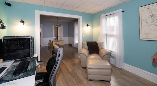 1341 3rd Ave N, Fargo, ND 58102 - office area featuring wood finished floors, a paneled ceiling, and a chandelier