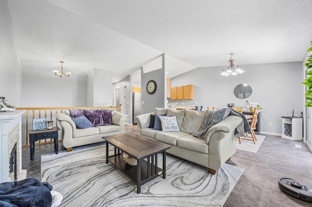 1030 Oak Pl, West Fargo, ND 58078 - living area with a chandelier, lofted ceiling, and a textured ceiling