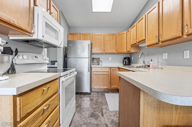 1030 Oak Pl, West Fargo, ND 58078 - kitchen featuring white appliances and light countertops