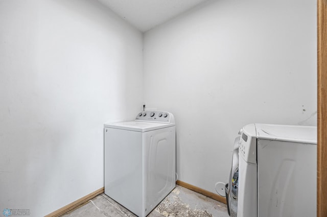 1030 Oak Pl, West Fargo, ND 58078 - laundry room featuring independent washer and dryer and baseboards