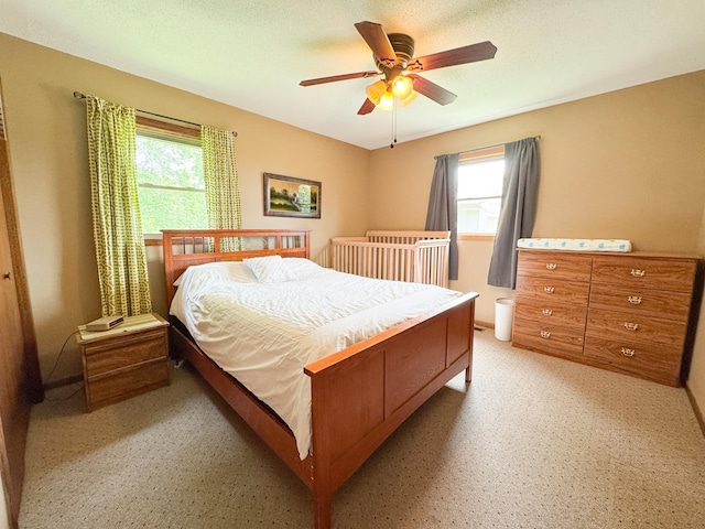 23336 County Highway 120, Fergus Falls, MN 56537 - bedroom featuring multiple windows and a ceiling fan