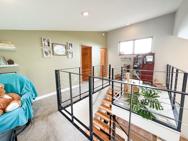 23336 County Highway 120, Fergus Falls, MN 56537 - hall featuring an upstairs landing, vaulted ceiling, carpet flooring, and recessed lighting