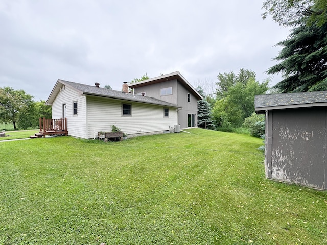 23336 County Highway 120, Fergus Falls, MN 56537 - rear view of house with a yard and a chimney