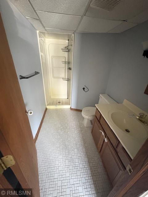 421 Dorland Rd S, Maplewood, MN 55119 - full bathroom featuring a shower stall, a paneled ceiling, and vanity