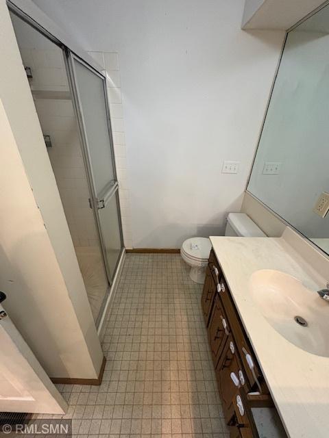 421 Dorland Rd S, Maplewood, MN 55119 - bathroom with vanity and a shower stall