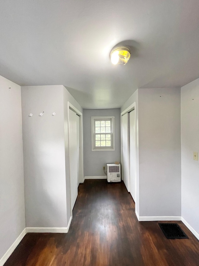 212 Sanborn St, Springfield, MN 56087 - empty room featuring wood finished floors and heating unit