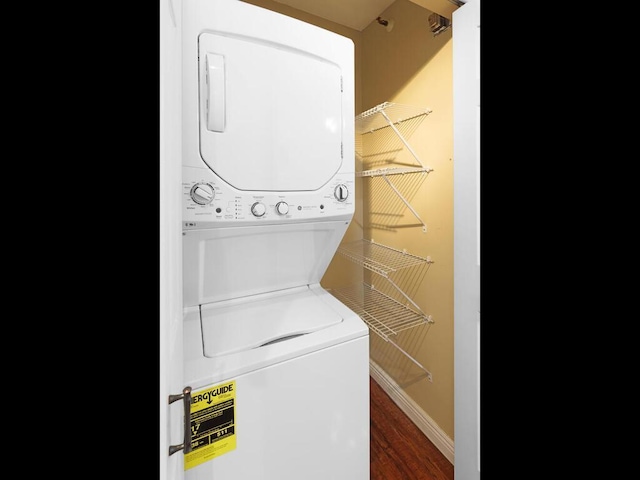 7605 Edinborough Way Unit 6314, Edina, MN 55435 - laundry area with stacked washer and clothes dryer and wood finished floors