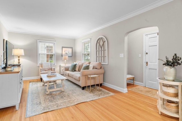 1921 James Ave, Saint Paul, MN 55105 - living area with arched walkways, crown molding, and light wood finished floors