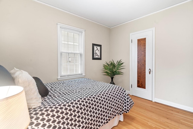 1921 James Ave, Saint Paul, MN 55105 - bedroom featuring ornamental molding and light wood-style flooring