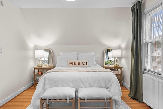 1921 James Ave, Saint Paul, MN 55105 - bedroom featuring radiator heating unit and light wood-style floors