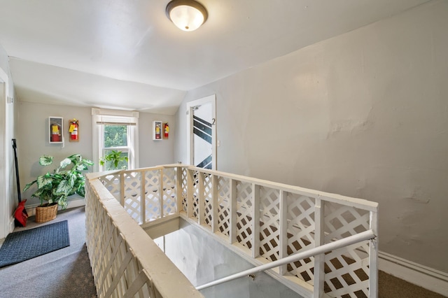893 Jenks Ave, Saint Paul, MN 55106 - staircase featuring carpet floors and vaulted ceiling