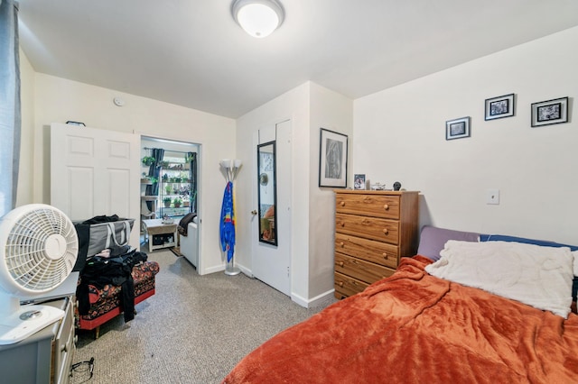 893 Jenks Ave, Saint Paul, MN 55106 - carpeted bedroom with baseboards