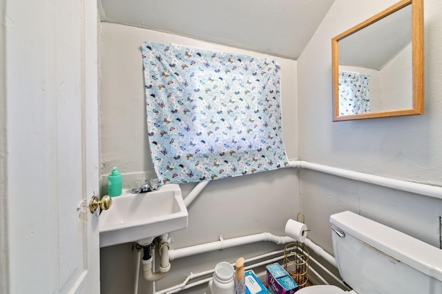 893 Jenks Ave, Saint Paul, MN 55106 - half bathroom with toilet and a sink
