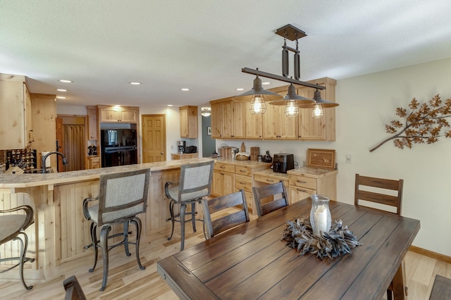 49760 202nd Pl, Mcgregor, MN 55760 - dining area with light wood-type flooring and recessed lighting