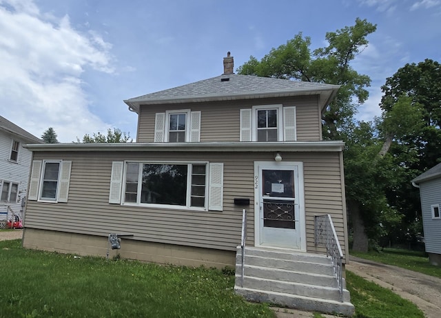 922 White St, Jackson, MN 56143 - traditional style home featuring a chimney