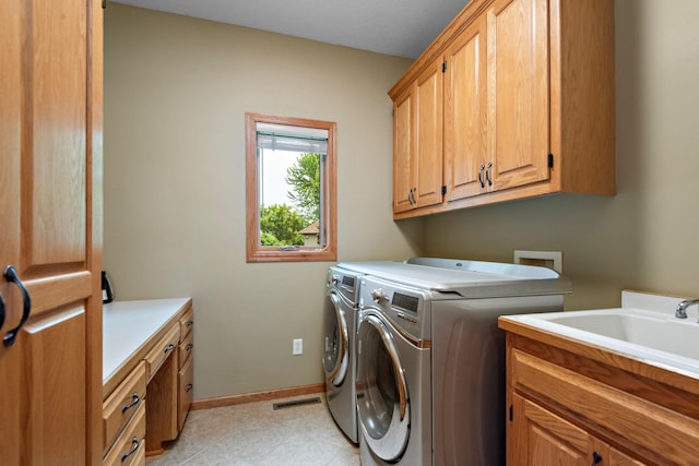 842 Vista Cir, Delano, MN 55328 - laundry room featuring cabinet space and washing machine and dryer