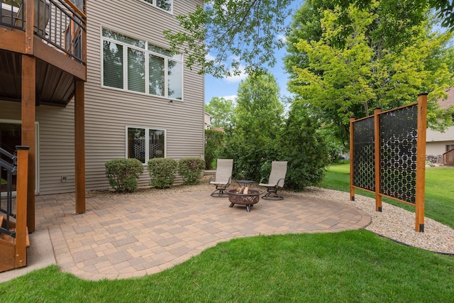 842 Vista Cir, Delano, MN 55328 - view of patio featuring an outdoor fire pit