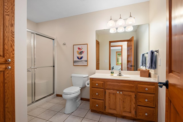 842 Vista Cir, Delano, MN 55328 - bathroom featuring tile patterned floors, vanity, and a stall shower