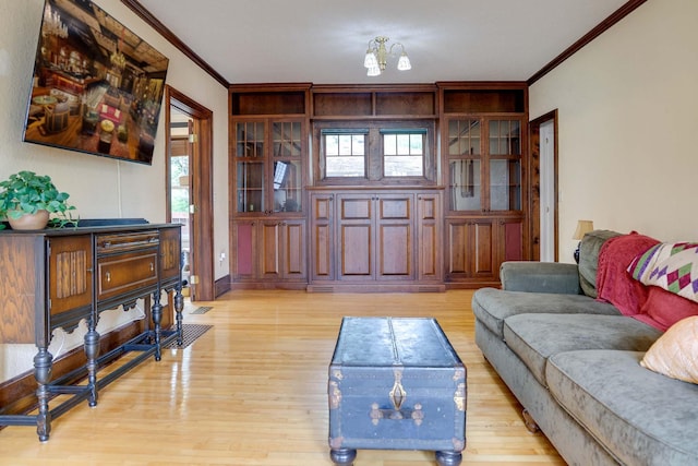 914 9th Ave N, Saint Cloud, MN 56303 - living room featuring ornamental molding and light wood finished floors