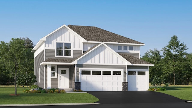7588 Norway Ln, Lino Lakes, MN 55038 - view of front of property with board and batten siding, asphalt driveway, a shingled roof, and a front lawn