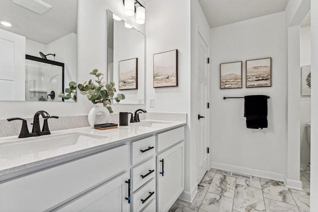 7588 Norway Ln, Lino Lakes, MN 55038 - full bathroom featuring marble finish floors, double vanity, a stall shower, and recessed lighting