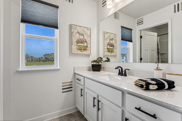 7588 Norway Ln, Lino Lakes, MN 55038 - bathroom with vanity and baseboards