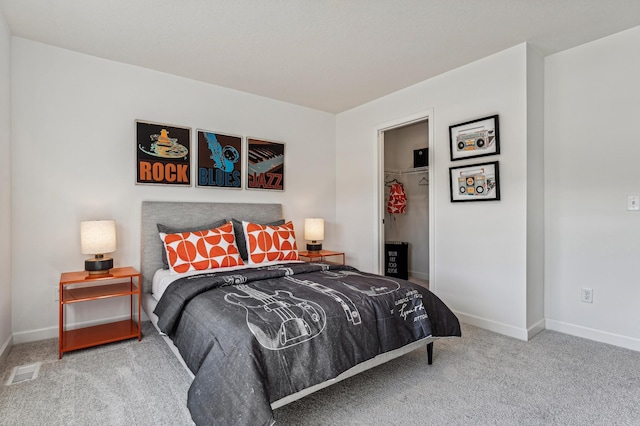 7588 Norway Ln, Lino Lakes, MN 55038 - carpeted bedroom with a walk in closet and a closet