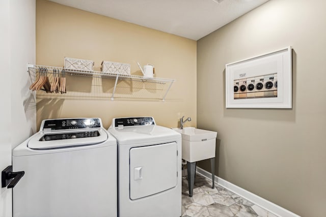 7588 Norway Ln, Lino Lakes, MN 55038 - laundry area with light marble finish flooring and independent washer and dryer