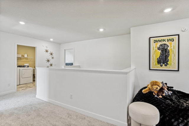 7588 Norway Ln, Lino Lakes, MN 55038 - hallway with separate washer and dryer, carpet flooring, recessed lighting, and an upstairs landing