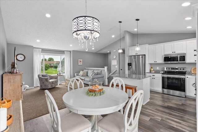 1272 Pheasant Run, New Richmond, WI 54017 - dining space with dark wood-type flooring, recessed lighting, and high vaulted ceiling